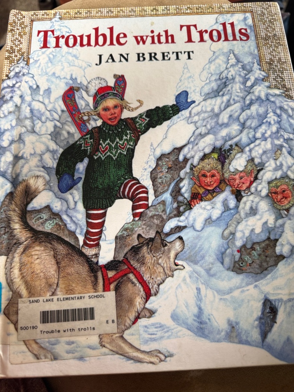 Trouble with Trolls by Jan Brett - Green & Red Winter Cover